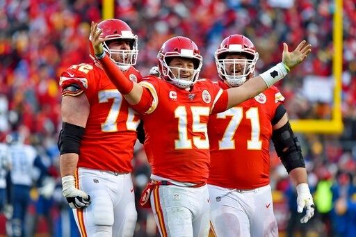 Chiefs players celebrate a touchdown.