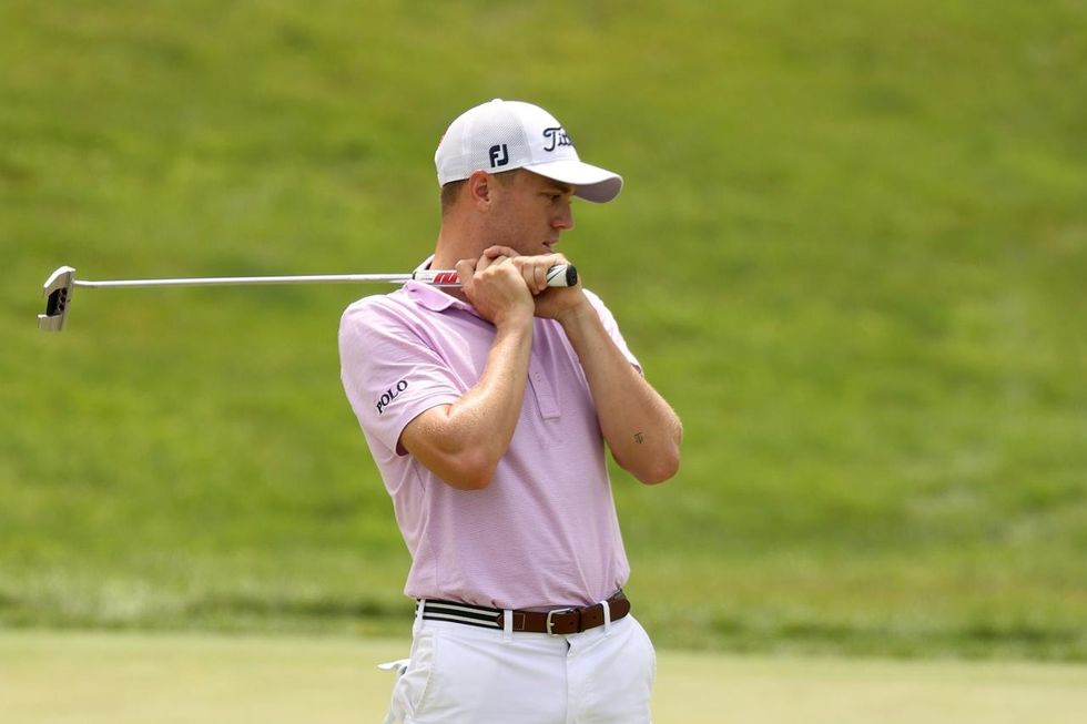 Justin Thomas reacts after missing a putt in the playoff