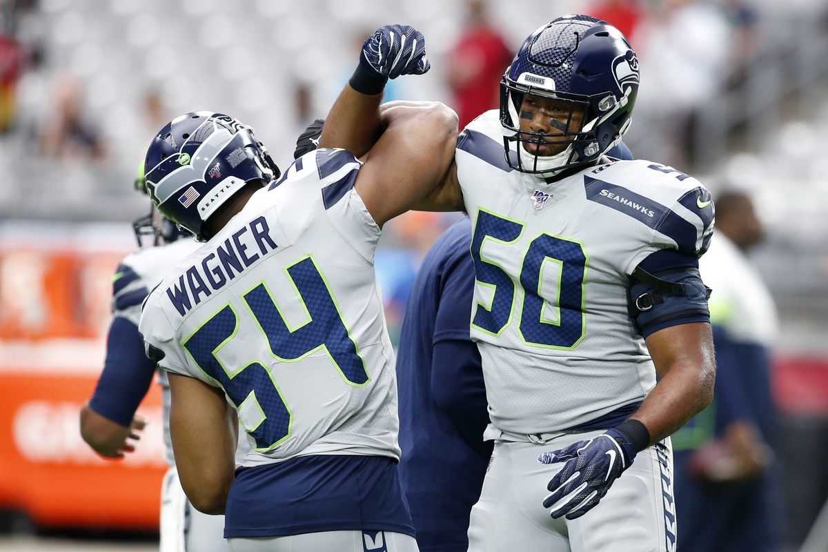 Bobby Wagner and the Seattle defense celebrate a stop
