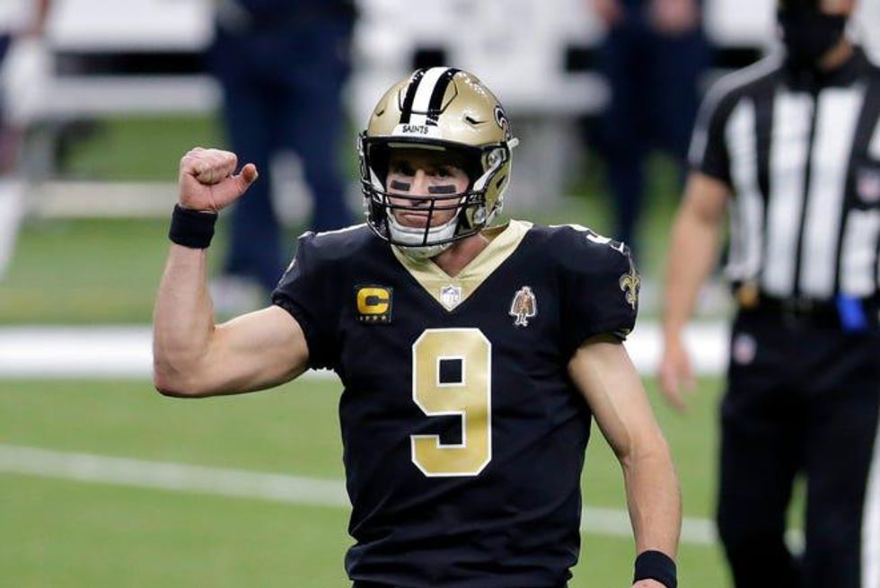 New Orleans Saints QB Drew Brees reacts after throwing a touchdown