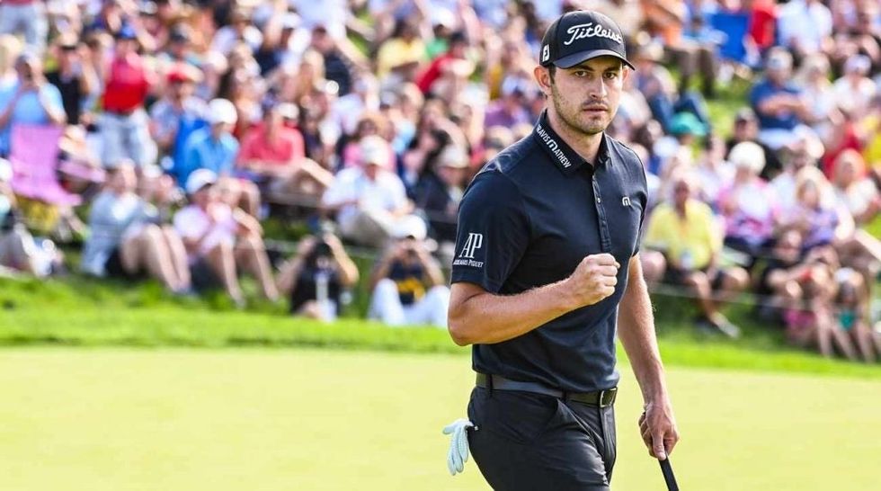 Patrick Cantlay reacts after making a putt