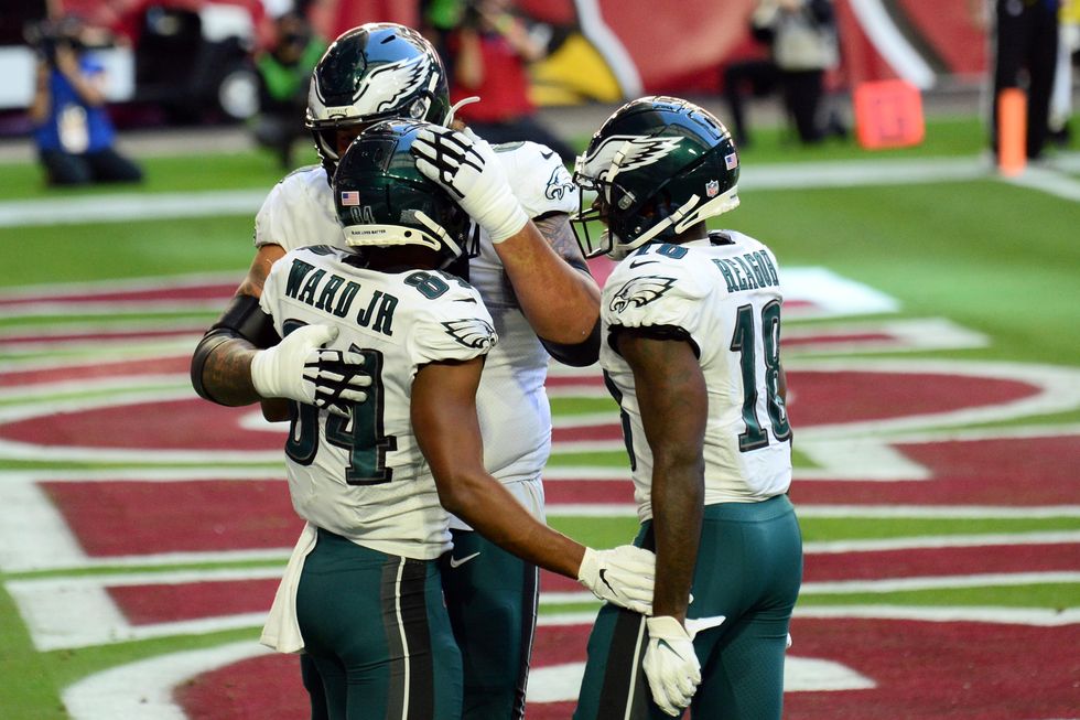 Philadelphia Eagles wide receiver Greg Ward (84) celebrates a touchdown against the Arizona Cardinals during the first half at State Farm Stadium.