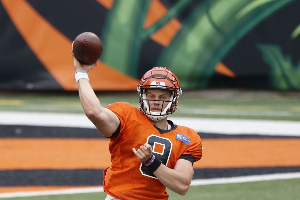 Joe Burrow throws a football