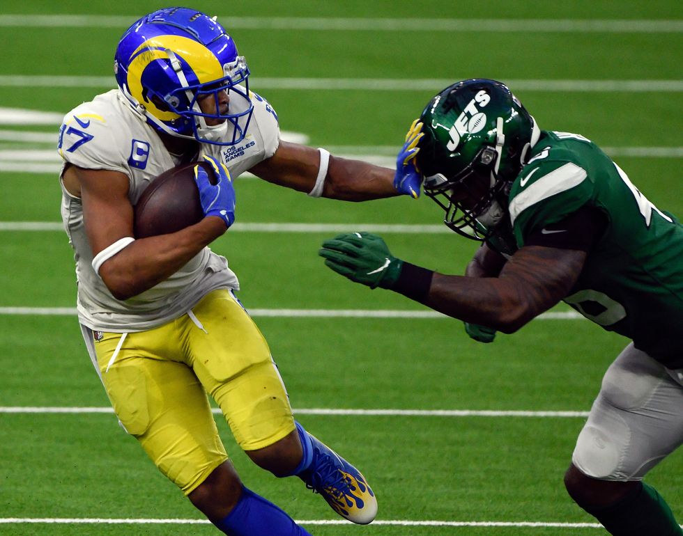 Los Angeles Rams wide receiver Robert Woods (17) moves the ball against New York Jets inside linebacker Neville Hewitt (46) during the fourth quarter at SoFi Stadium.