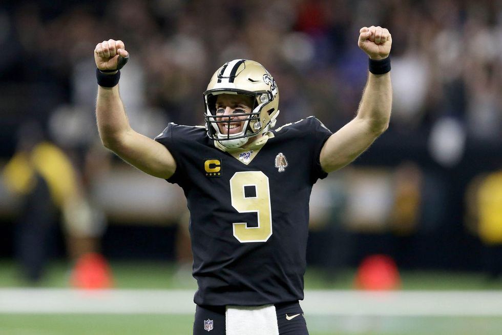 New Orleans Saints quarterback Drew Brees celebrates