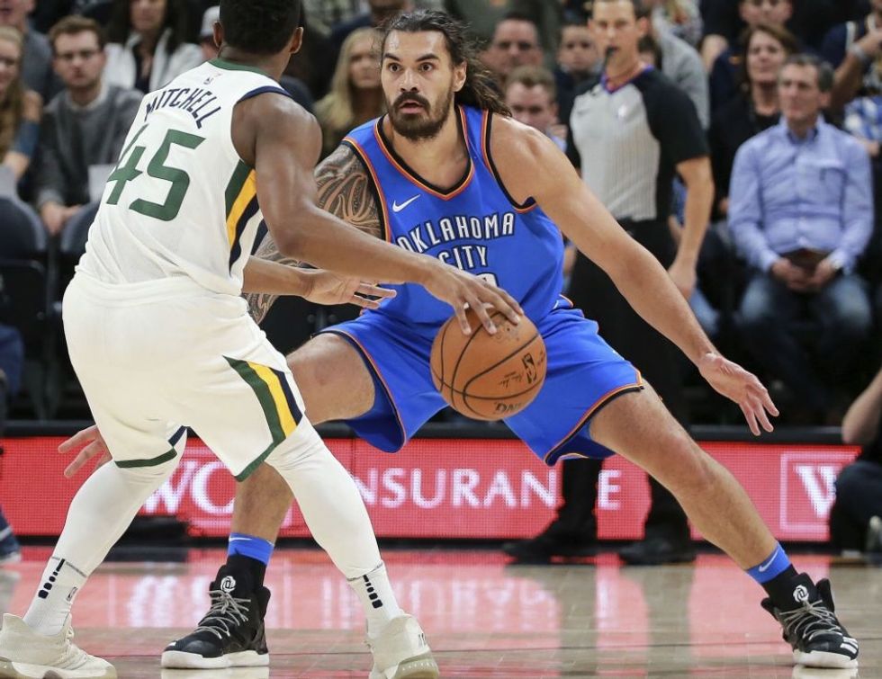 Steven Adams of Oklahoma City and Donovan Mitchell of Utah