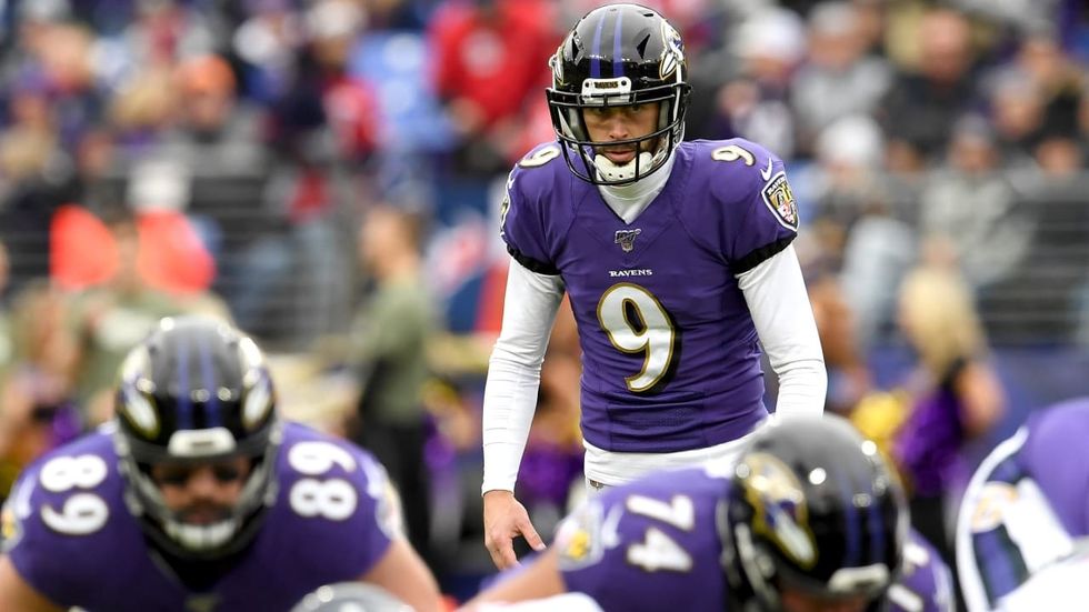 Justin Tucker lines up a kick